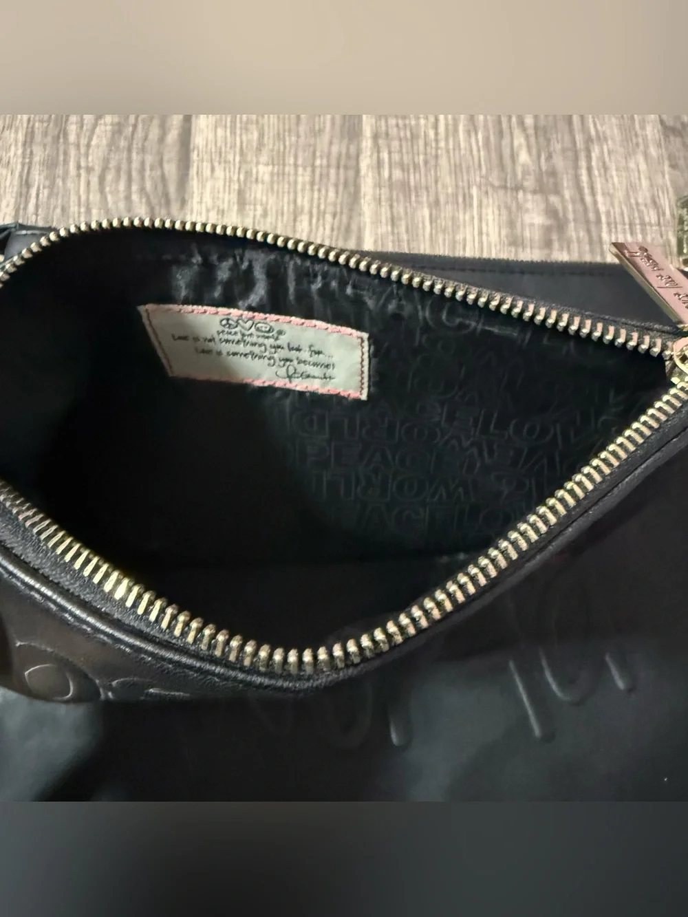 2 Peace Love World Black Embossed Leather Clutch Wristlets